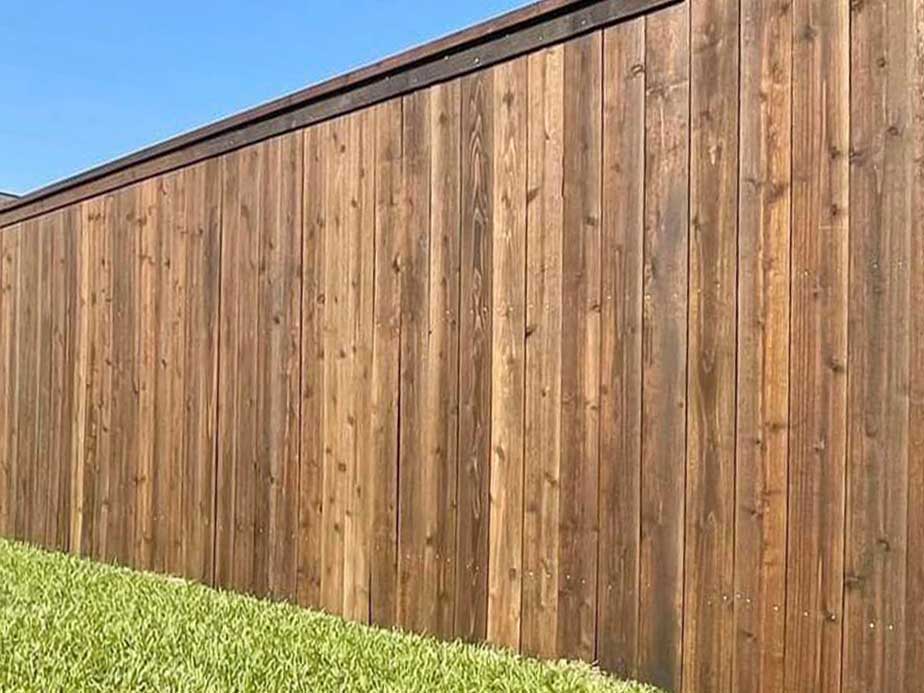 Branch LA cap and trim style wood fence